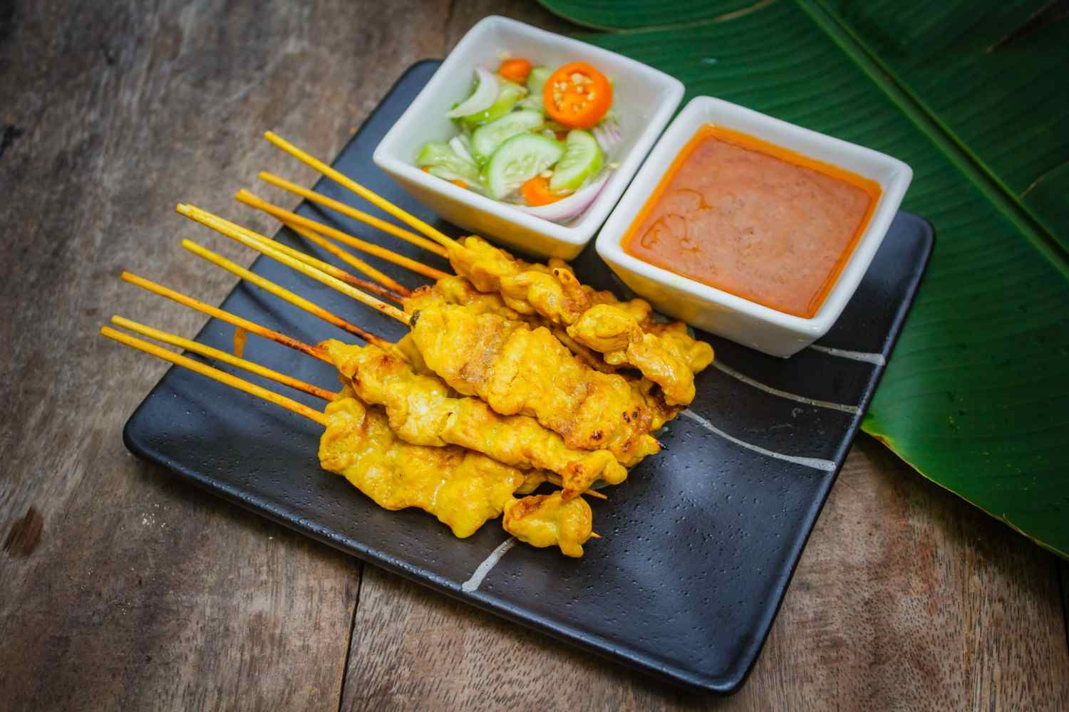 Assorted hibachi and Thai dishes presented for sharing